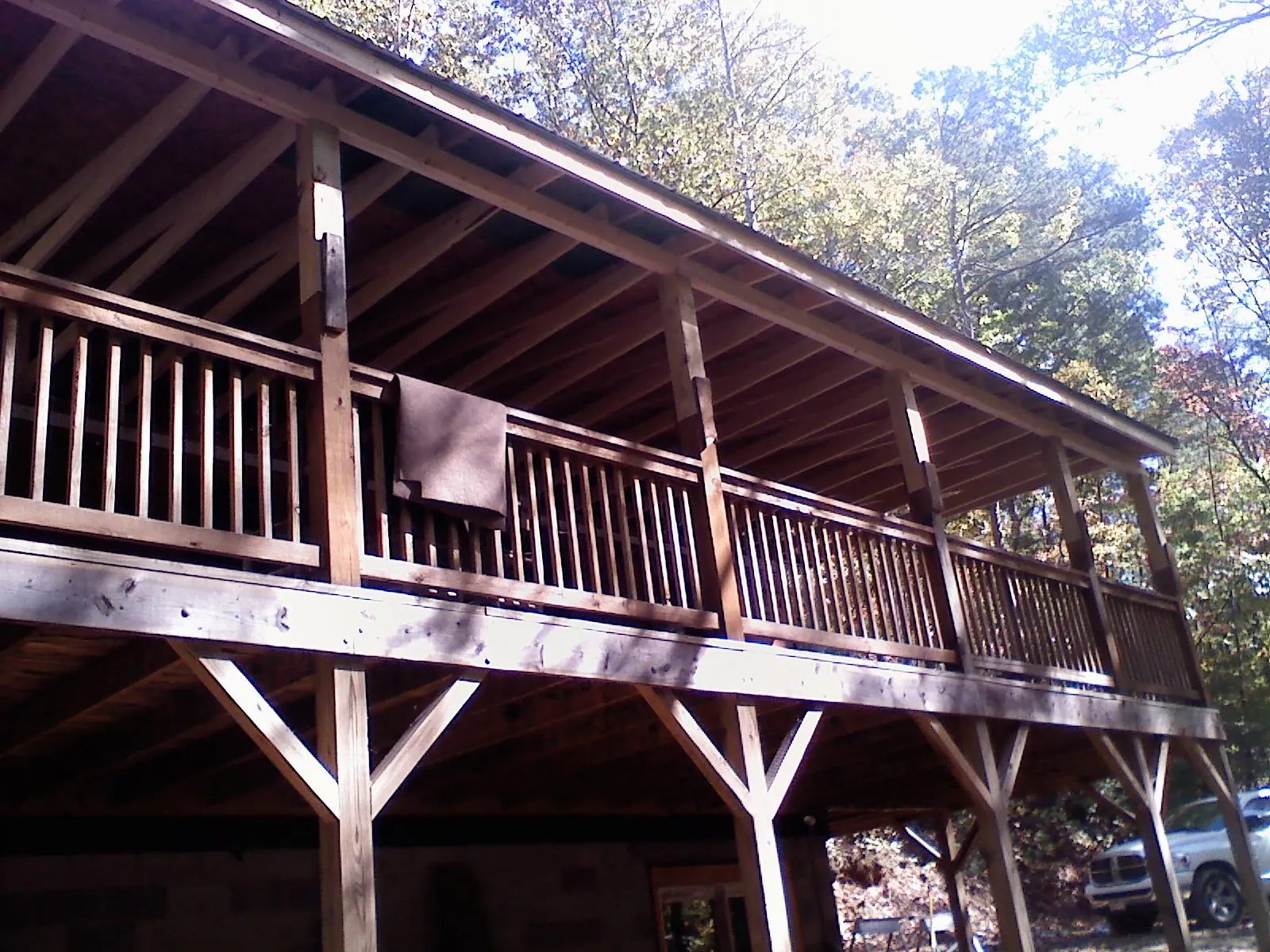 Timber framing under a new elevated porch and deck — Roof Leak Repair in Huntington Mills by Roofing Brothers